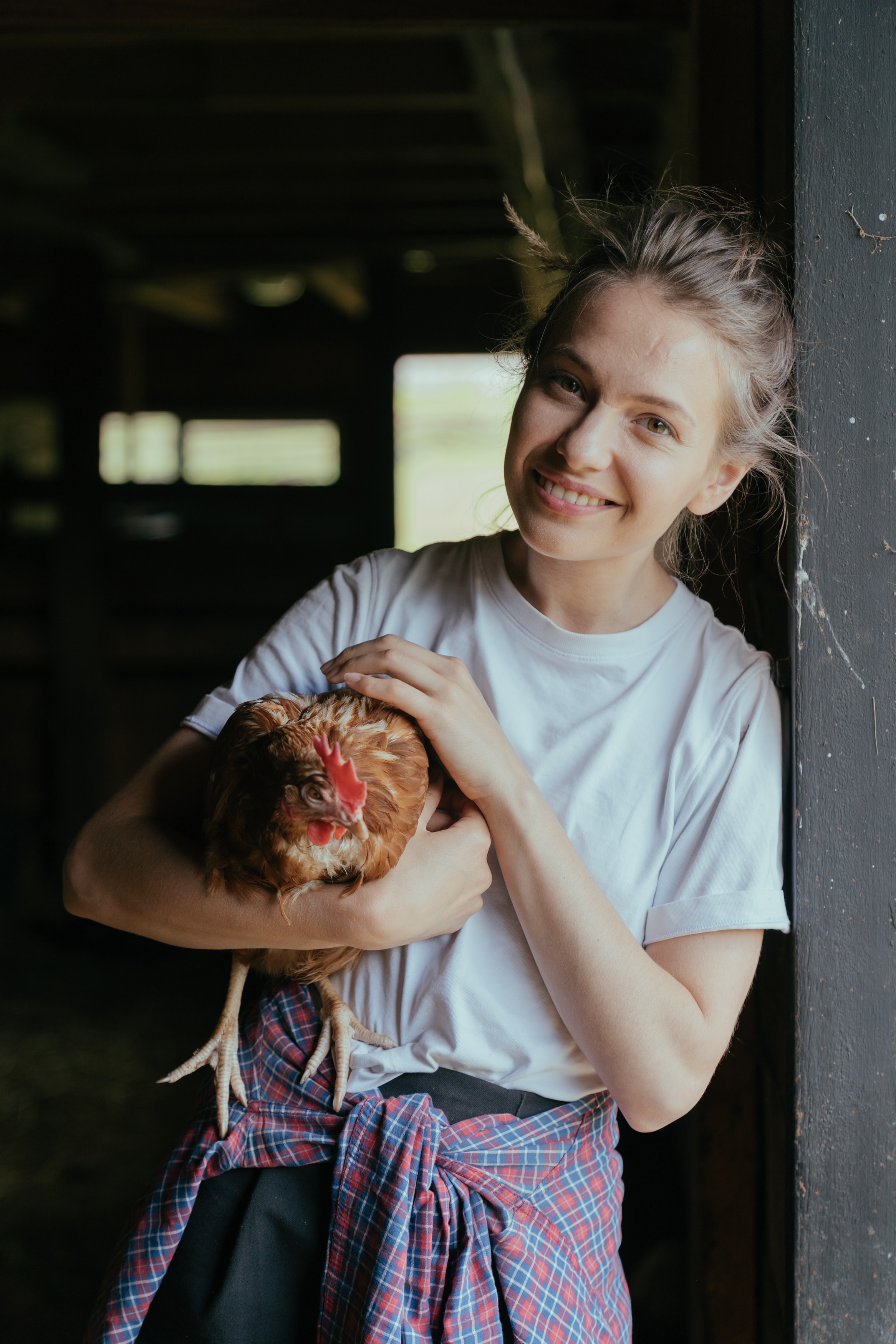 Lady holding chicken