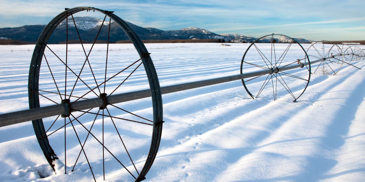 farm field covered in snow