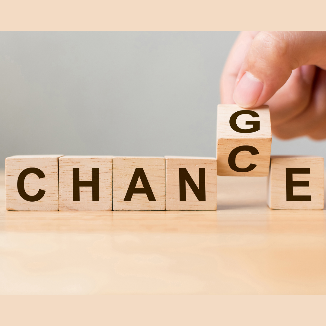 Change spelt out by beige blocks and the "G" in the word is transitioning to a "C". This image alludes to the fact that change can also a chance
