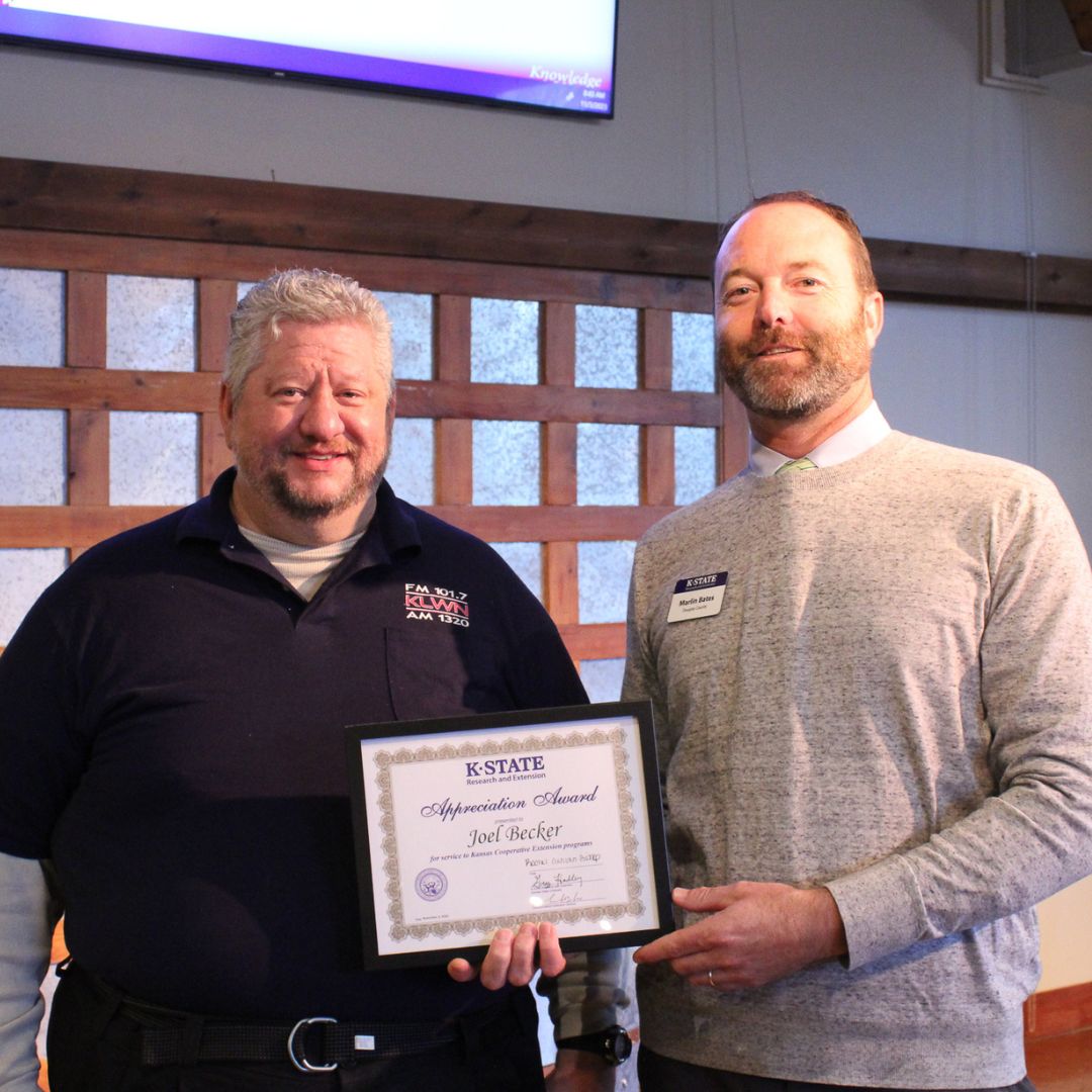 Joel and Marlin along with Joel's Extension Appreciation Award 