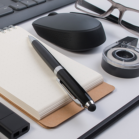 office supplies arranged on desk.