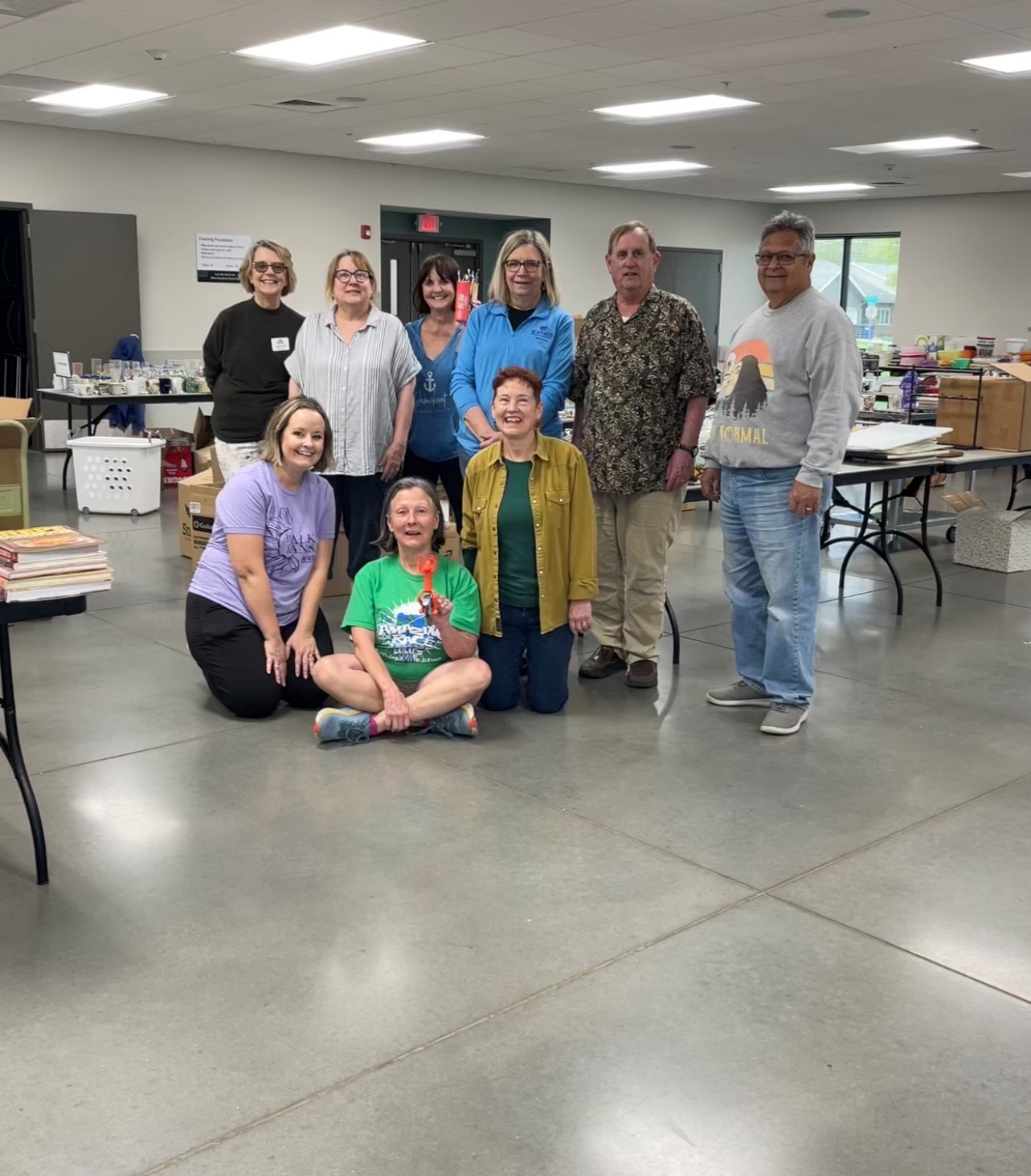 Kitchen sale Extension Master Food Volunteer workers with Kaitlyn Peine posing after completing set up for the kitchen sale 