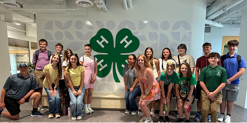 the 2026 Douglas County CWF group stands in front of the 4- H Logo at the national 4-H headquarters 