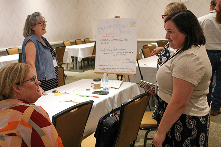 2025 Food Summit attendees working together. 